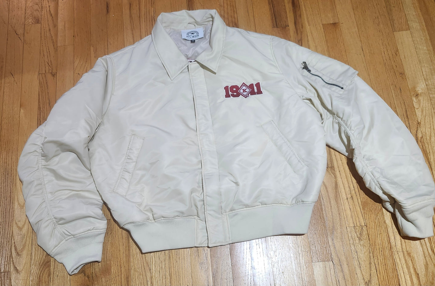 Kream Bomber Jacket with Krimson Embroidery on front and back